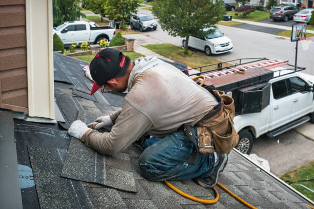 Professional Roofing technician working in Beach City, TX